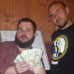 louisiana tournament organizer jelly, who's holding a wad of cash and standing with the late krucial b