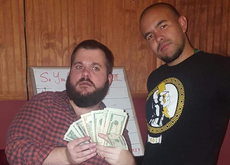 louisiana tournament organizer jelly, who's holding a wad of cash and standing with the late krucial b